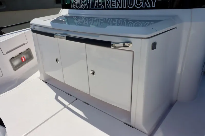 Slide: The Image of 2022 Axopar 37 XC Cross Cabin boat storage area, Louisville, Kentucky. - 44