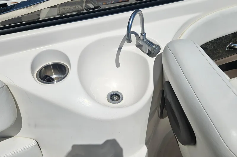 Slide: The Image of 2006 Regal 2400 Bowrider with built-in sink and faucet. - 17