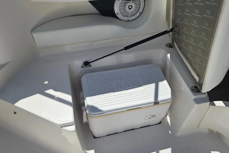 Slide: The Image of 2006 Regal 2400 Bowrider with Igloo cooler in storage compartment. - 18