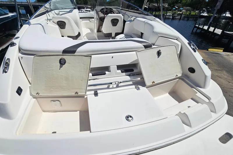 Slide: The Image of Interior view of a 2006 Regal 2400 Bowrider boat at the dock. - 6