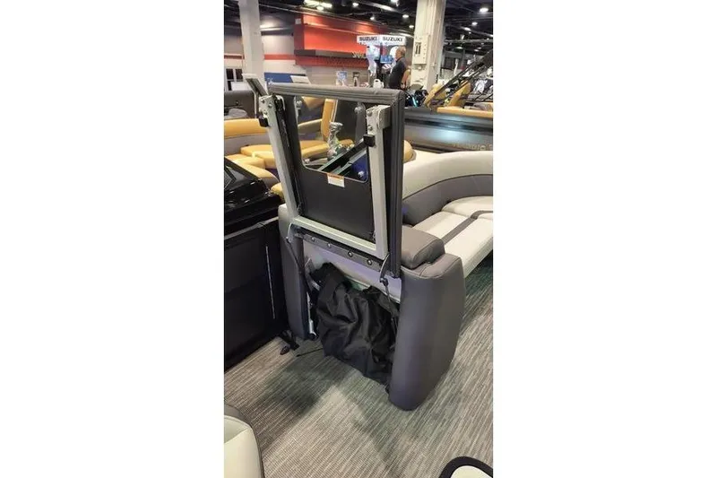 Slide: The Image of Viaggio X22Q 2026 boat with raised seat and storage compartment. - 6