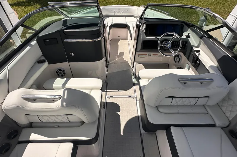 Slide: The Image of Interior of 2025 Regal LX6 with luxurious white seating. - 7