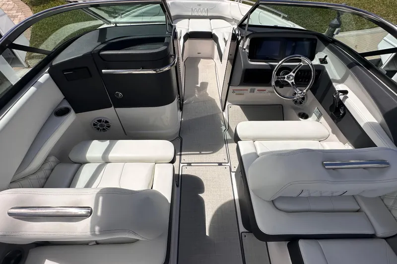 Slide: The Image of Interior of 2025 Regal LX6 with luxurious white seating. - 8