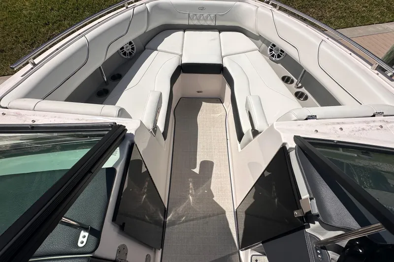 Slide: The Image of Interior of 2025 Regal LX6 boat with white seating. - 9