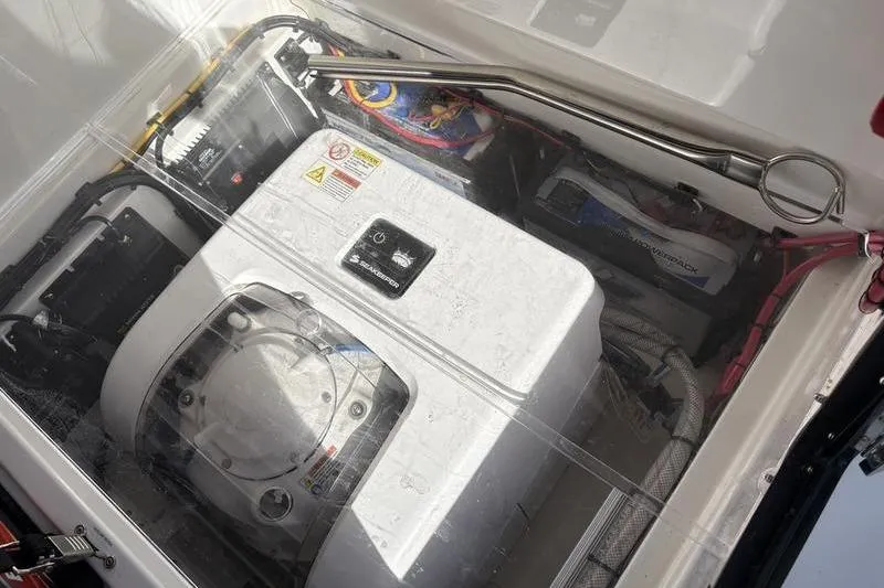 Slide: The Image of Stuart 27 boat engine from 2025 in engine compartment. - 14