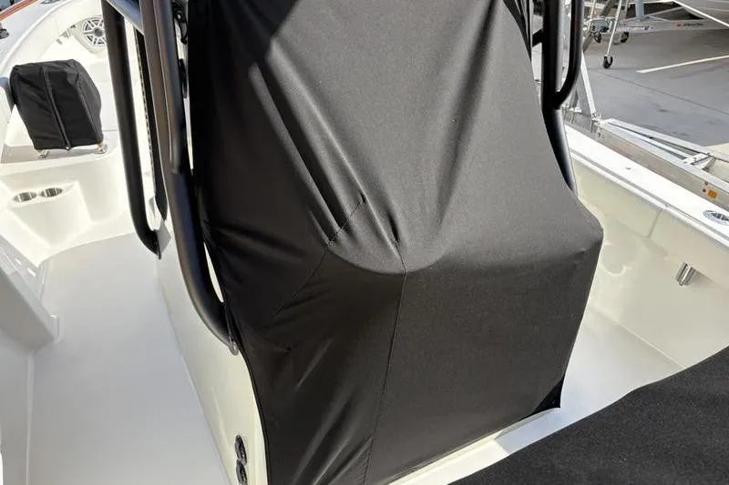 Slide: The Image of Covered helm of a 2025 Stuart 27 boat. - 16