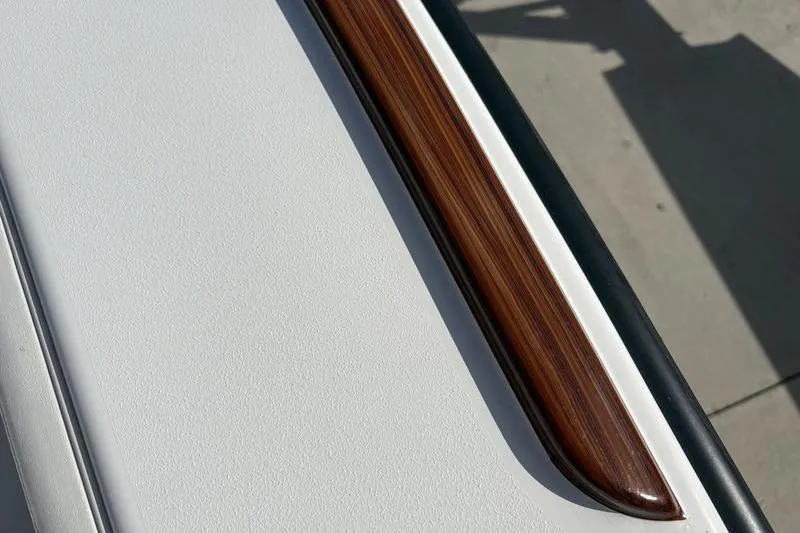 Slide: The Image of Close-up of a wood detail on a Stuart 27 boat, year 2025. - 20