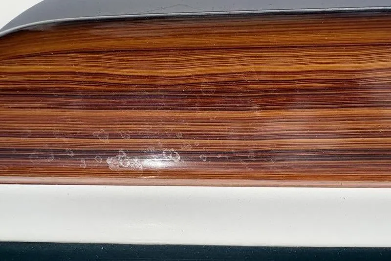 Slide: The Image of Wood grain on Stuart 27 boat, year 2025. - 23