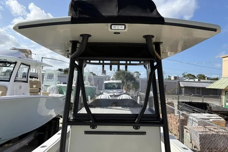 Slide: The Image of Stuart 27 boat, 2025 model, parked at the marina. - 3