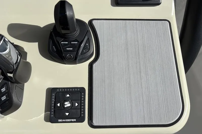 Slide: The Image of Control console of a 2025 Stuart 27 boat. - 34