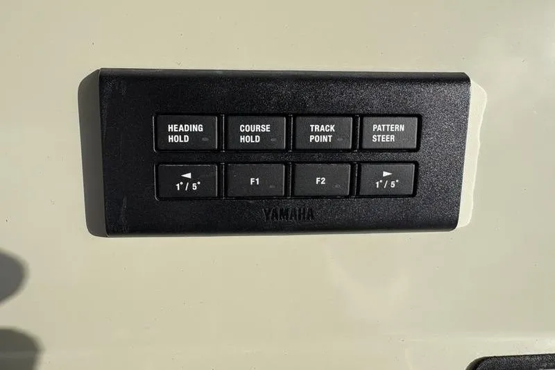 Slide: The Image of Yamaha control buttons on Stuart 27, model year 2025. - 35