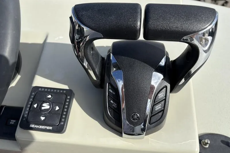 Slide: The Image of Stuart 27 boat controls with Seakeeper system, year 2025. - 42