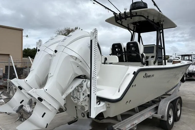 Slide: The Image of 2025 Stuart 27 boat with dual engines on trailer. - 5