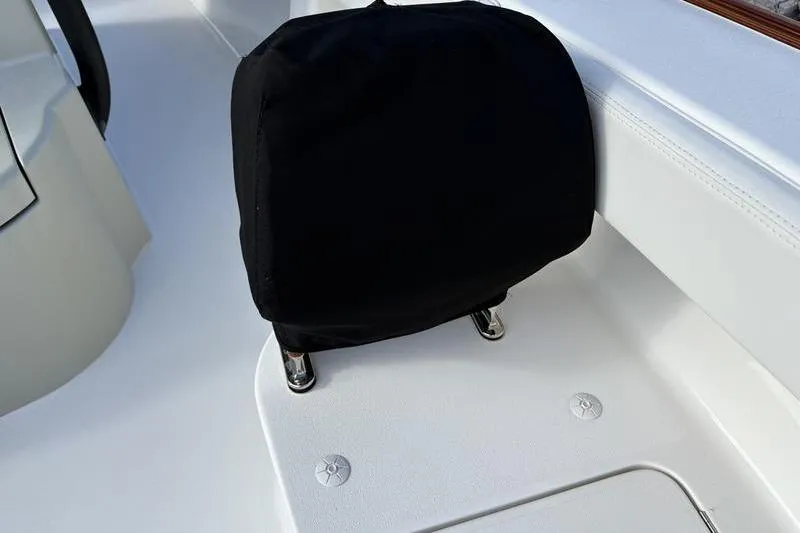 Slide: The Image of Covered seat on a Stuart 27 boat, model year 2025. - 8
