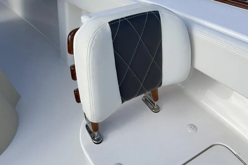 Slide: The Image of Stuart 27 boat seat, white and black, 2025 model. - 9