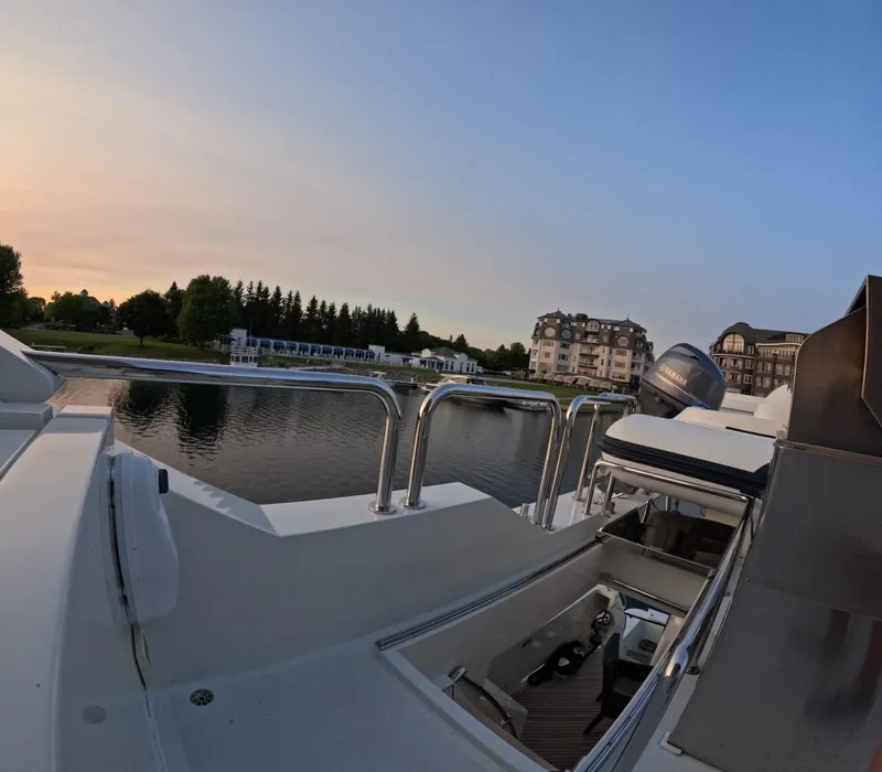 Slide: The Image of Luxury Hargrave yacht docked by scenic waterfront at sunset, 2007 model. - 12