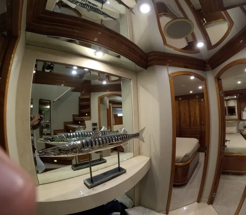 Slide: The Image of Luxurious interior of 2007 Hargrave 93' yacht with elegant decor and mirrored walls. - 32