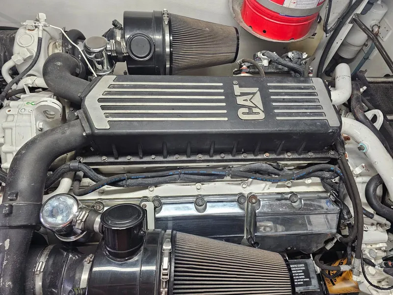 Slide: The Image of Engine of a 2007 Hargrave 93' yacht with CAT branding. - 42