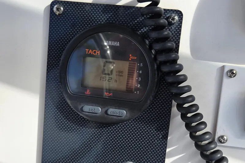 Slide: The Image of Yamaha tachometer on 2008 Clearwater 2300 Center Console boat. - 10