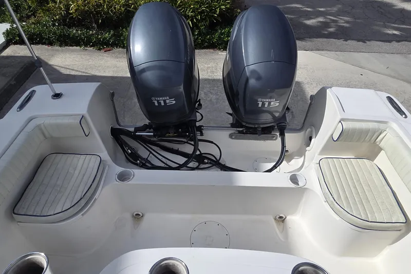 Slide: The Image of 2008 Clearwater 2300 Center Console with twin Yamaha 115 engines. - 7