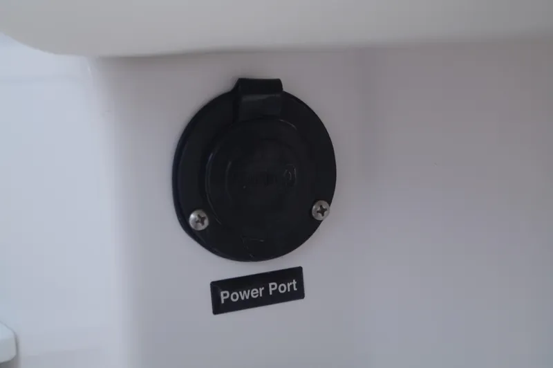 Slide: The Image of Power port on Everglades 235 Center Console boat, year 2023. - 12