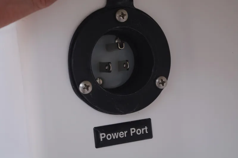 Slide: The Image of Power port on Everglades 235 Center Console 2023 boat. - 13