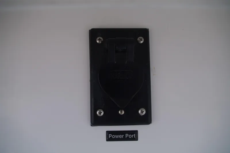 Slide: The Image of Everglades 235 Center Console 2023 power port. - 15