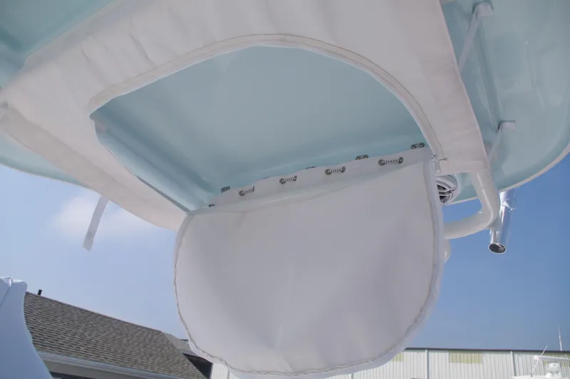 Slide: The Image of Everglades 235 Center Console 2023 boat canopy with storage. - 23