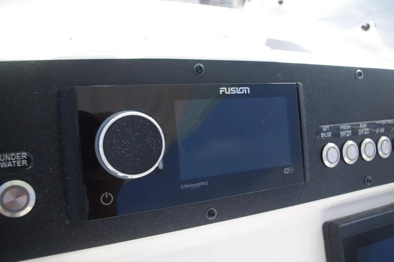 Slide: The Image of Fusion audio system in Everglades 235 Center Console 2023 boat. - 30