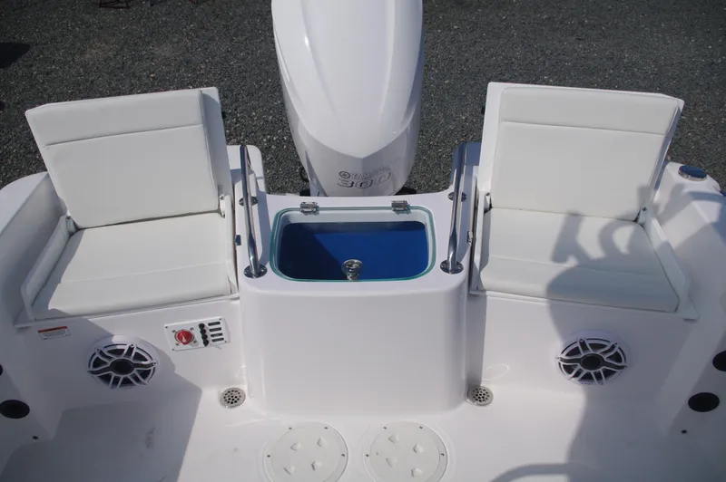 Slide: The Image of 2023 Everglades 235 Center Console with seating and storage. - 7