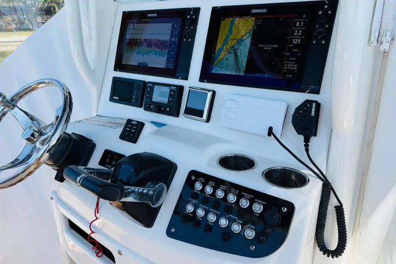 Slide: The Image of NauticStar 28 XS 2021 boat console with Simrad electronics. - 4