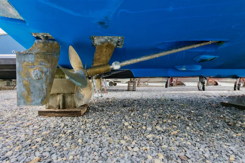 Slide: The Image of Propeller and rudder of a 2004 Topaz 32 Express. - 12