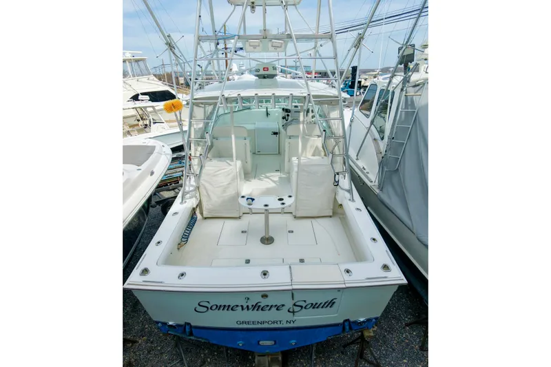 Slide: The Image of 2004 Topaz 32 Express boat stern view - 2