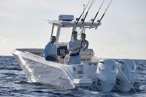 Slide: The Image of 2027 Sailfish 252 CC boat with anglers fishing in open water. - 4