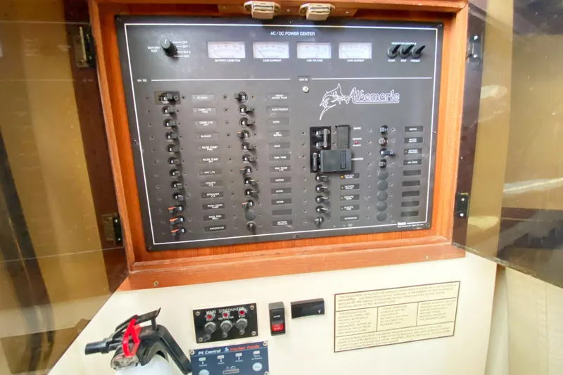 Slide: The Image of Electrical control panel of a 1997 Albemarle 30 Express boat. - 28