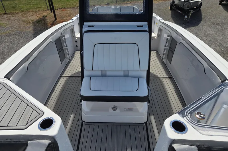 Slide: The Image of Interior of 2023 Yamaha Boats 255 FSH Sport E with seating area. - 16