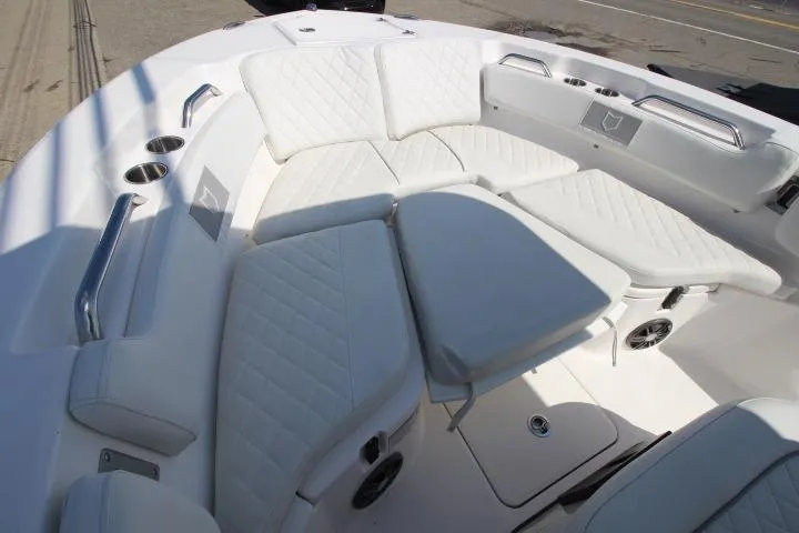 Slide: The Image of Luxurious seating area on 2026 Sea Fox 228 Commander boat with white upholstery. - 15