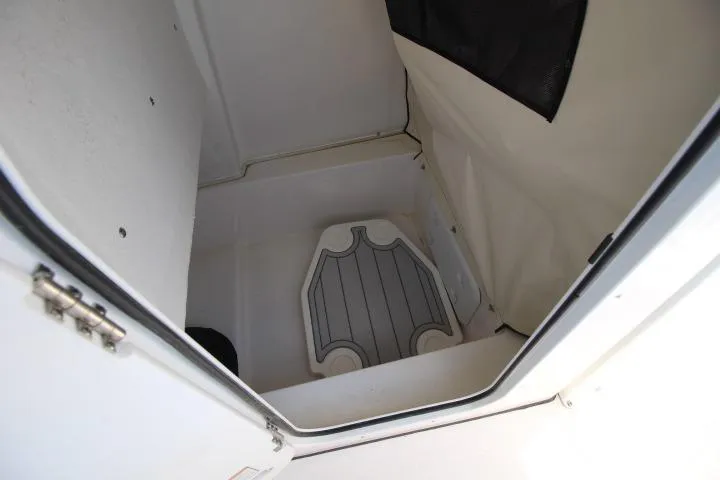 Slide: The Image of Interior view of 2026 Sea Fox 228 Commander boat compartment with non-slip flooring. - 18