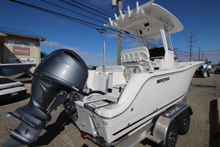 Slide: The Image of 2026 Sea Fox 228 Commander boat with Yamaha outboard motor on trailer. - 3