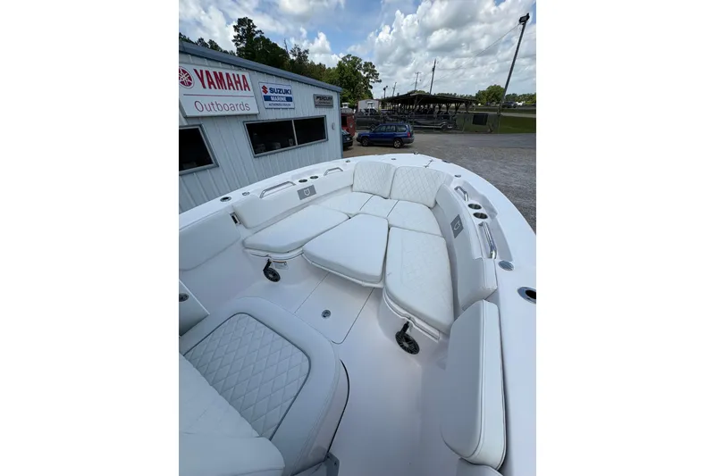 Slide: The Image of 2026 Sea Fox 248 Commander boat interior with white seating and steering wheel. - 12