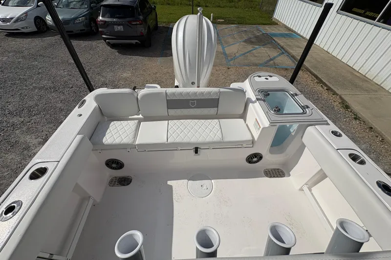 Slide: The Image of 2026 Sea Fox 248 Commander boat interior with seating and fishing rod holders. - 15