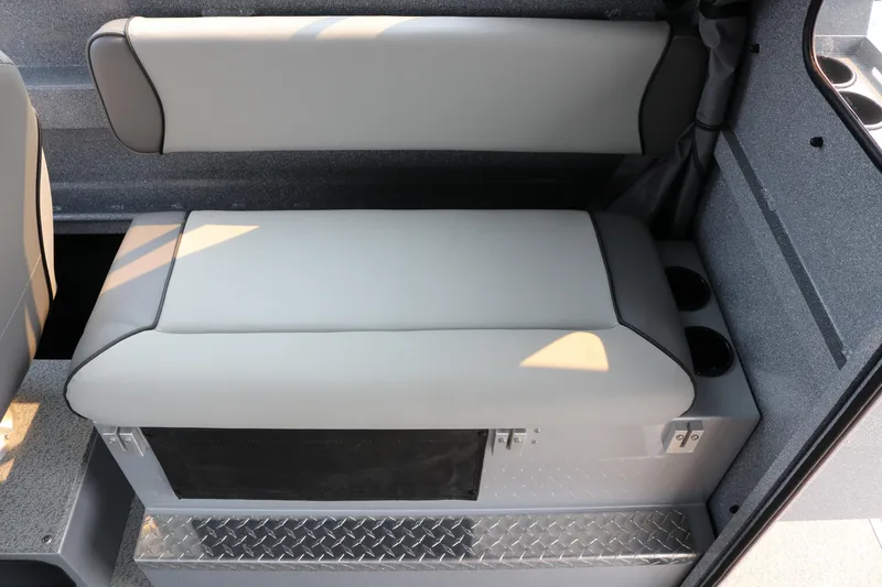 Slide: The Image of 2026 KingFisher 2425 Escape HT interior seating with storage and cup holders. - 17