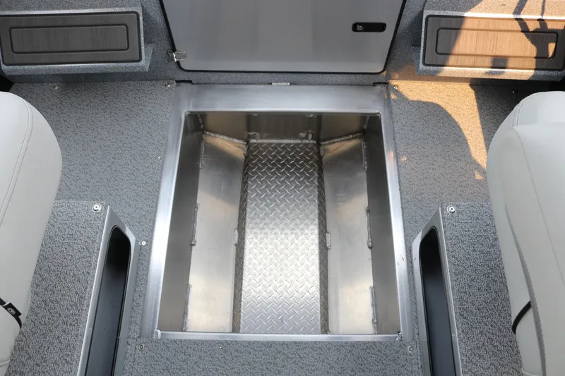 Slide: The Image of Interior view of 2026 KingFisher 2425 Escape HT boat, featuring a metal storage compartment. - 25