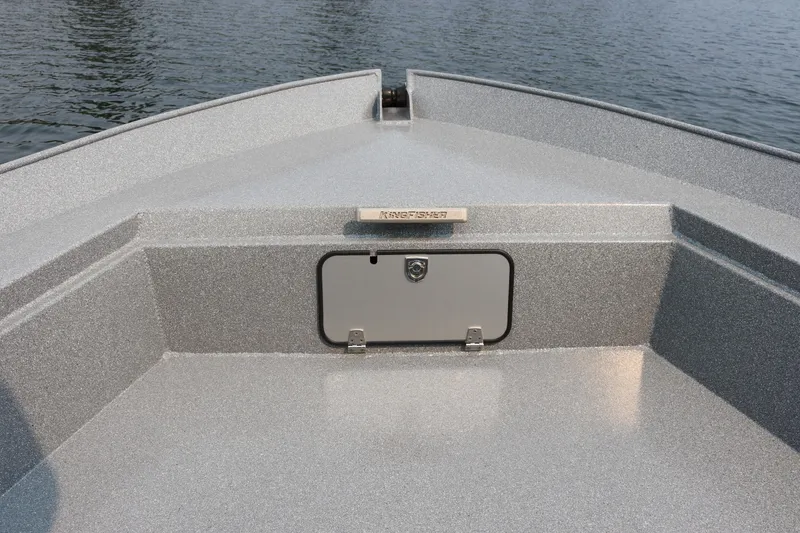 Slide: The Image of Bow of 2026 KingFisher 2425 Escape HT boat on water. - 27