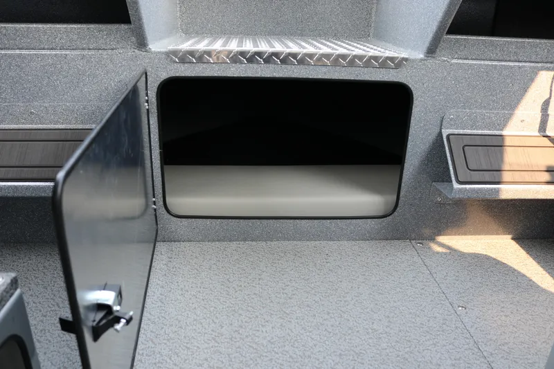 Slide: The Image of Interior storage compartment of 2026 KingFisher 2425 Escape HT boat. - 28