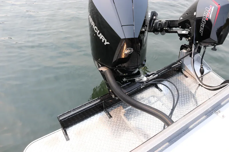 Slide: The Image of Outboard motors on 2026 KingFisher 2425 Escape HT boat, docked on water. - 29