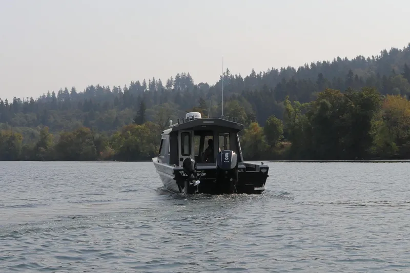 Slide: The Image of KingFisher 2425 Escape HT 2026 on a serene lake. - 34