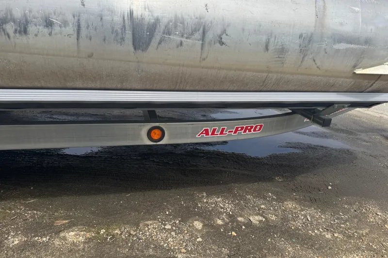 Slide: The Image of Crest II LM 2003 boat with All-Pro sticker, close-up view. - 4