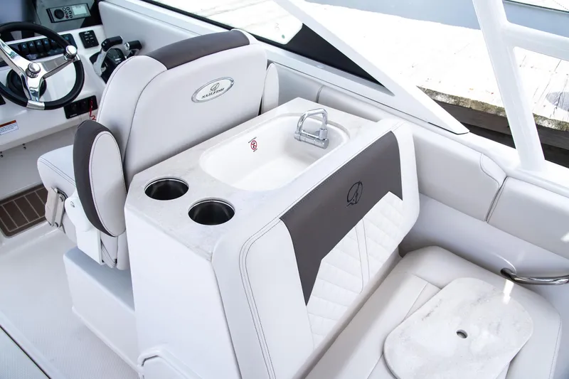Slide: The Image of Interior of 2027 Sailfish 276 DC boat featuring helm and sink area. - 15