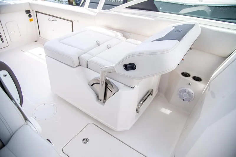 Slide: The Image of 2027 Sailfish 276 DC boat interior with white seating and modern design. - 18